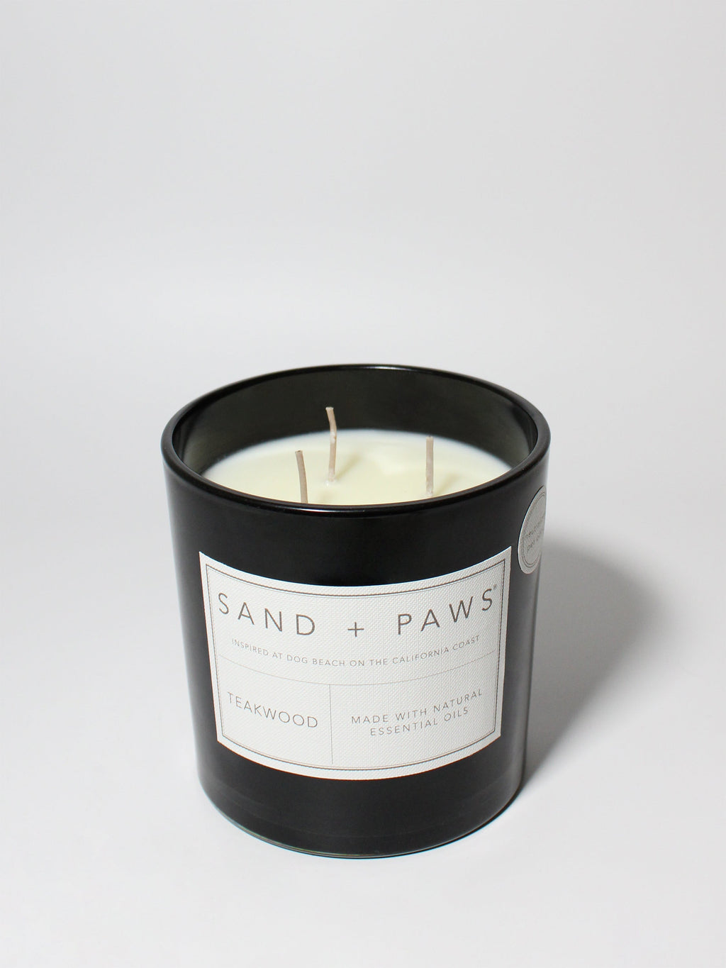 Cozy Sand + Paws Teakwood 21 oz scented candle